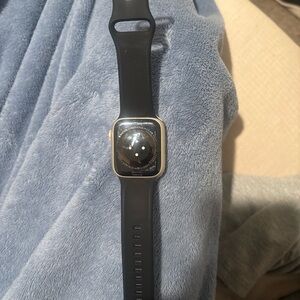 Apple Smartwatch with Black Band and Gold Case